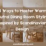Discover 10 Ways to Master Warm Neutral Dining Room Styling Inspired by Scandinavian Design (Cozy, Elegant & Timeless). From solid wood dining tables and layered natural textures to minimalist table settings, warm lighting, greenery, and clutter-free styling, these Scandinavian dining room ideas will help you create a welcoming space filled with warmth, comfort, and timeless Nordic elegance. Perfect for anyone looking for cozy dining room inspiration, warm neutral decor, hygge home ideas, and modern Scandinavian interiors.